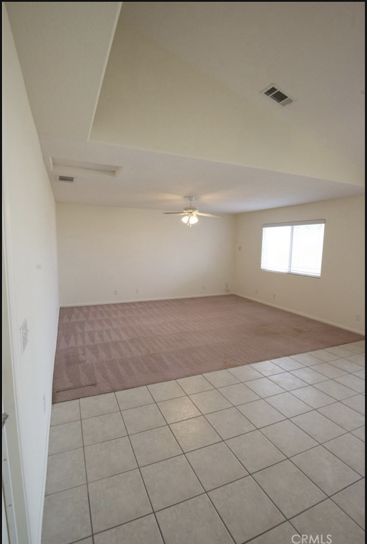 Living room as listed, unstaged